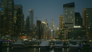 a city skyline with boats and buildings